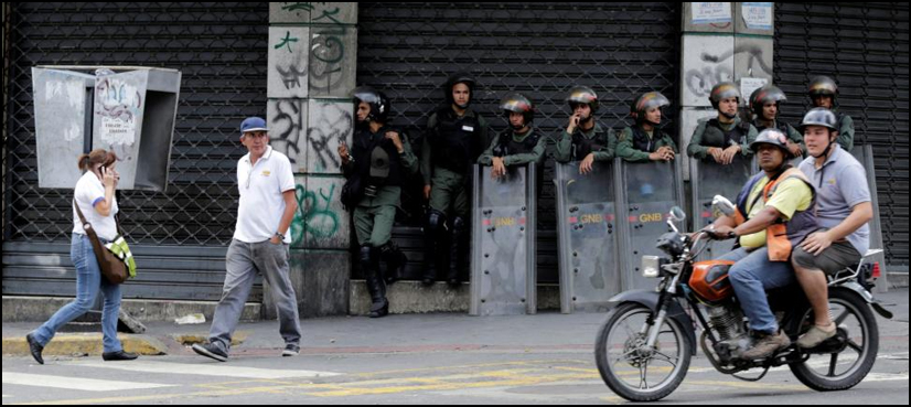 'We want food!', Venezuelans cry at protest near presidency