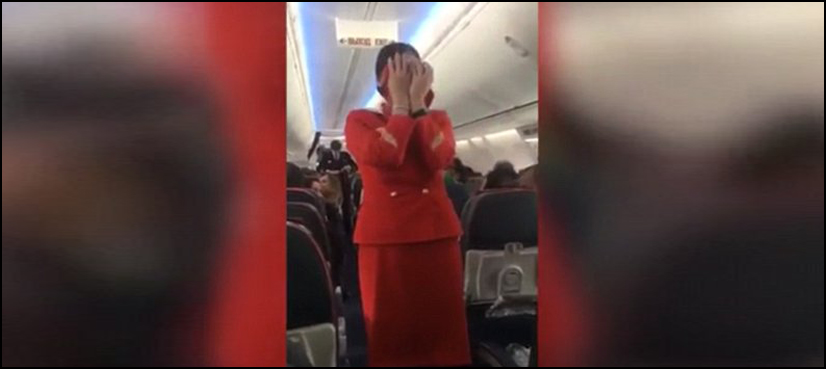 WATCH: Rowdy football fans distract air hostess doing safety announcement