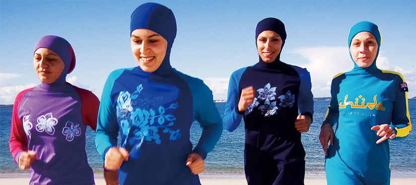 Woman forced to remove clothes after burkini ban in France