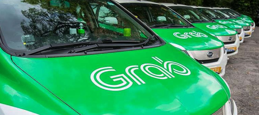 Uber rival Grab partners with driverless car firm in Singapore