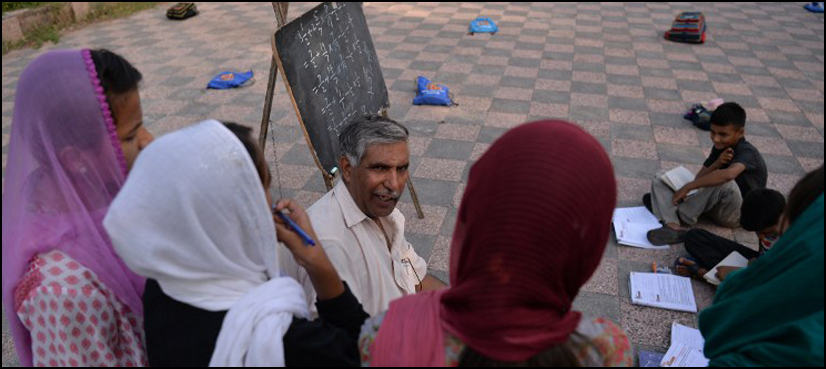 Master Ayub's classroom offers beacon of hope for Islamabad's poor