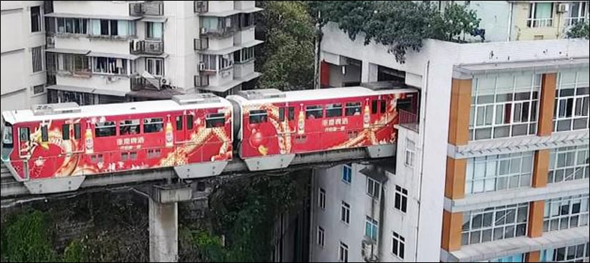 VIDEO: Incredible train goes through building in China
