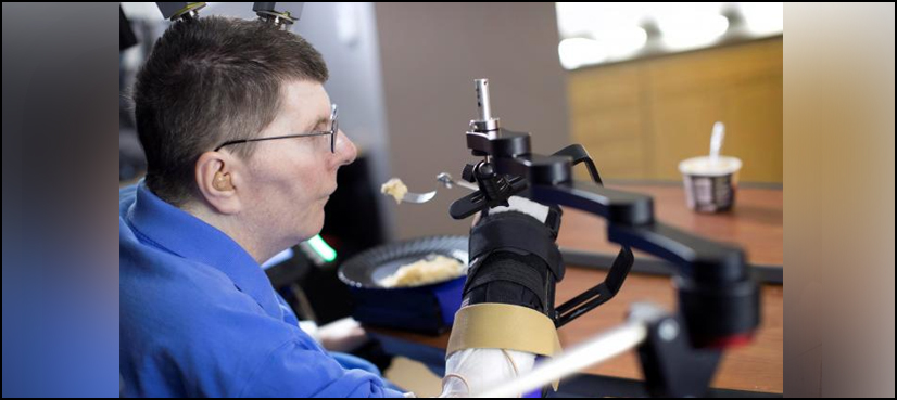 Brain implant lets paralysed man feed himself using his thoughts
