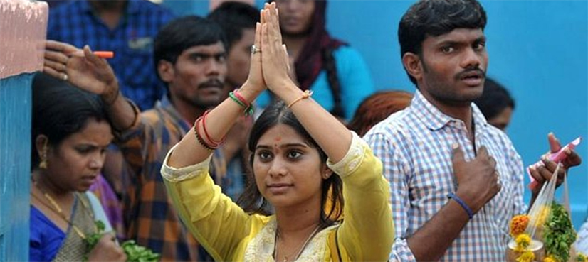 Indians throng temple to crack Trump's visa curbs