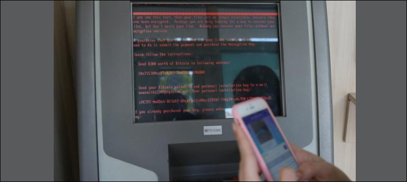 Cyber attack sweeps globe, researchers see 'WannaCry' link