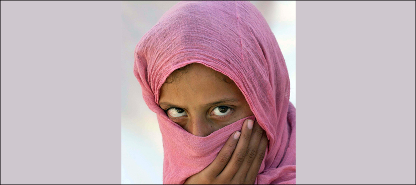 Woman tied to electricity pole over 'hurling stone on bus'