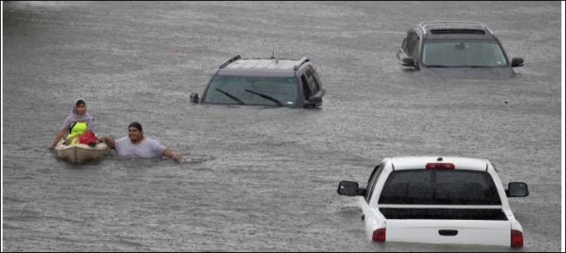 Besieged Houston braces for more flooding as Harvey lingers