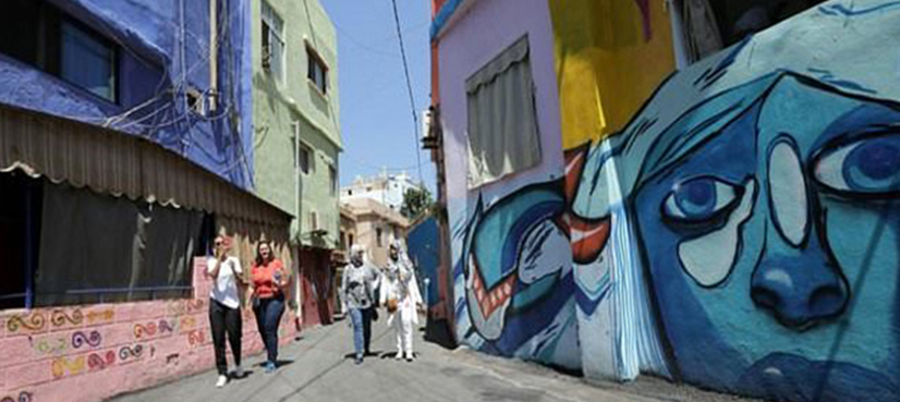 Street art brings colour to rundown Beirut suburb
