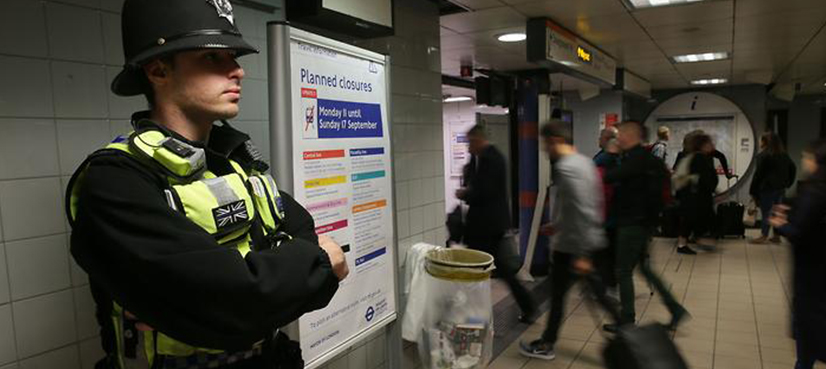 Manhunt for London bomber as threat level raised