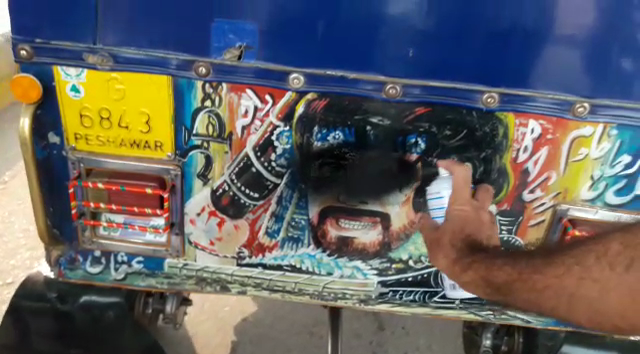 Peshawar police is removing signs and paintings promoting violence and immorality from rickshaws