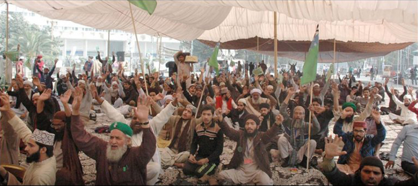 Tehreek-e-Labbaik activists observe Eid Milad-un-Nabi at Lahore protest camp