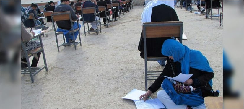 Afghan mum cradling baby during university exam goes viral