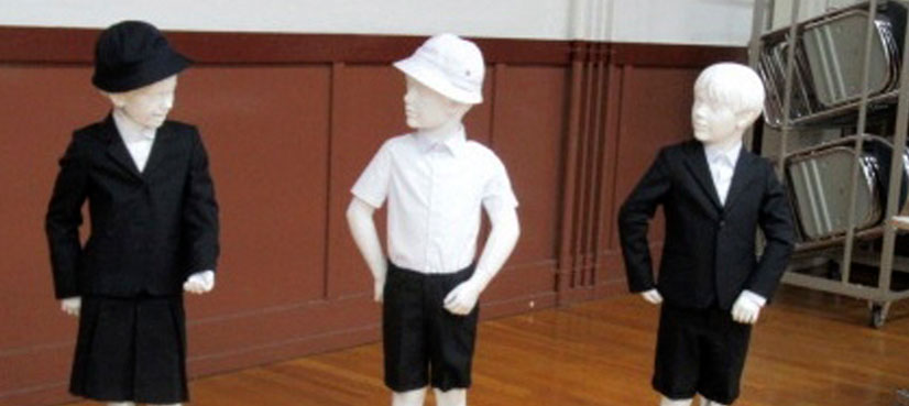 School hires guards after introducing Armani-branded uniform