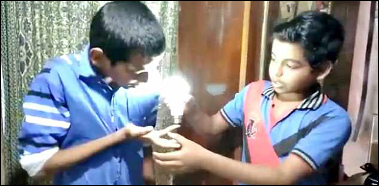 VIDEO: Indian boy appears to light LED bulbs with his bare skin