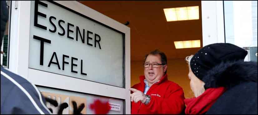 German food charity lifts ban on meals for migrants