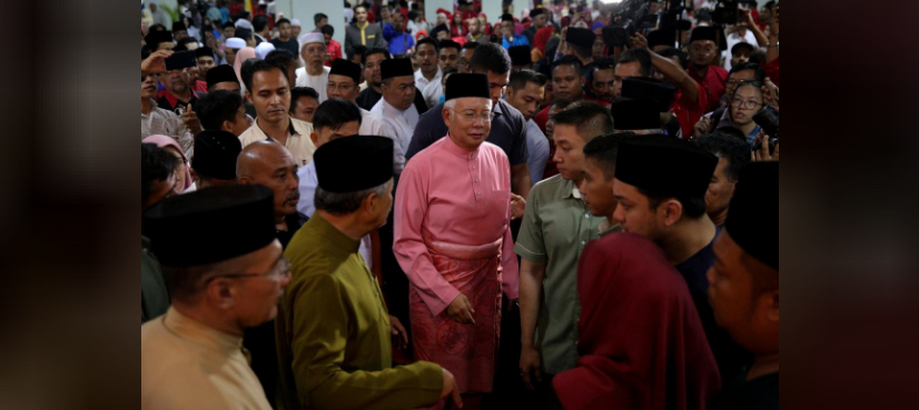 Malaysia bars scandal-plagued ousted PM from leaving country