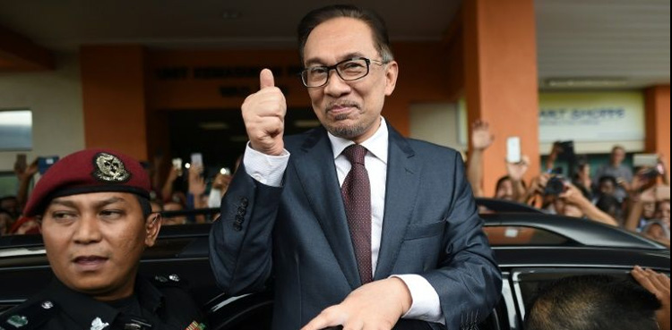 Anwar declares 'new dawn' in Malaysia after walking free from jail