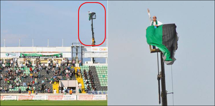 Turkish football fan hires crane to watch the game after being banned from stadium