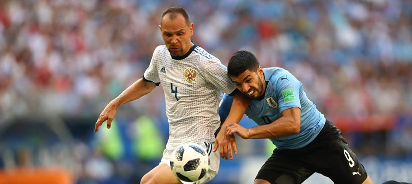 Uruguay top World Cup Group A, Russia second after 3-0 defeat