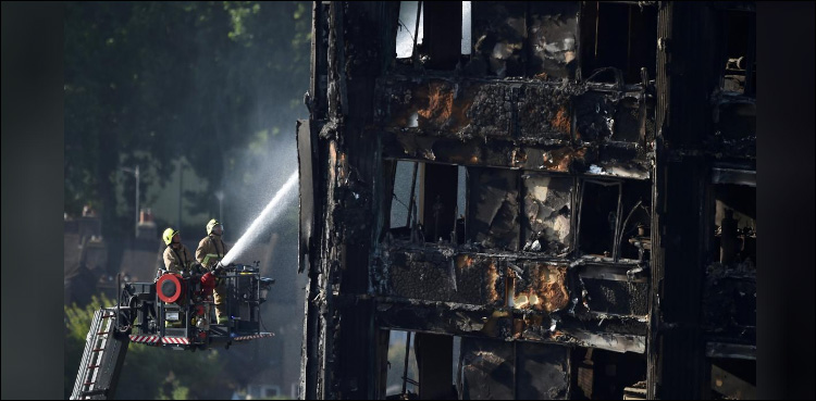 Anger and grief as Britain marks Grenfell fire anniversary