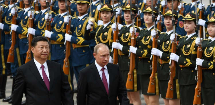 China hosts Russia, Iran for summit as US tensions rise