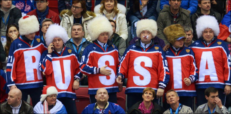 On train to Sochi, Russia fans eye semi-final spot