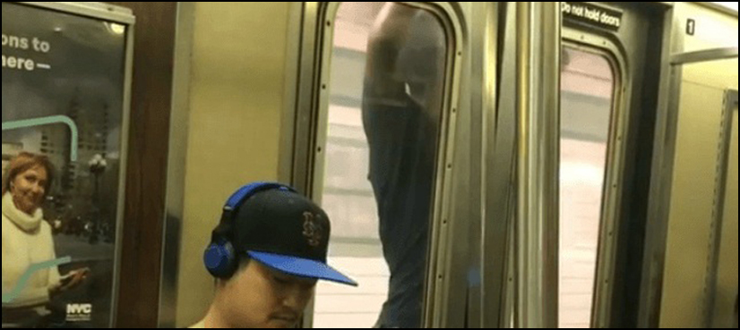 Man rides on outside of New York subway, police launch probe
