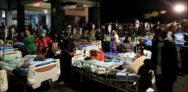 Powerful quake on Indonesia's Lombok island kills 91, tourists flee