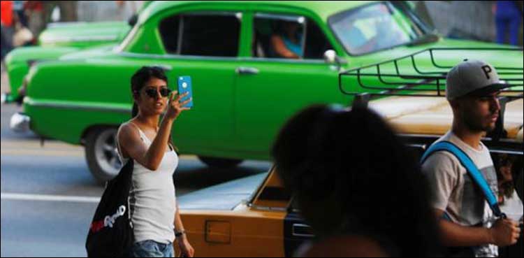 Cubans cheer as internet goes free nationwide for a day