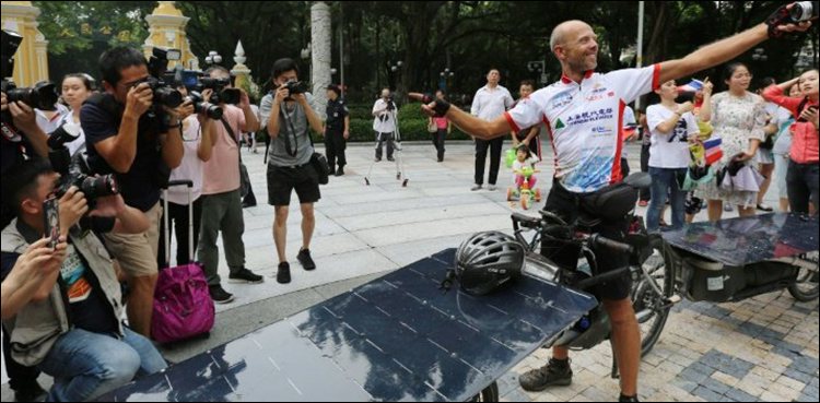 Biker wins first France to China 'Solar bike' race