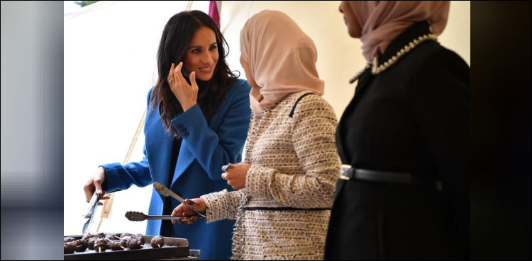 Duchess Meghan joined by her mother for launch of London Grenfell cookbook