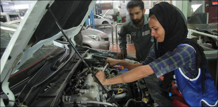 The female car mechanic driving change in Multan