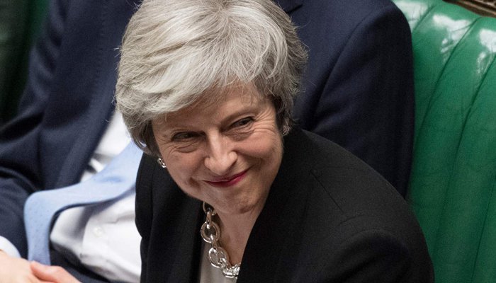 British lawmakers instruct May to change Brexit deal