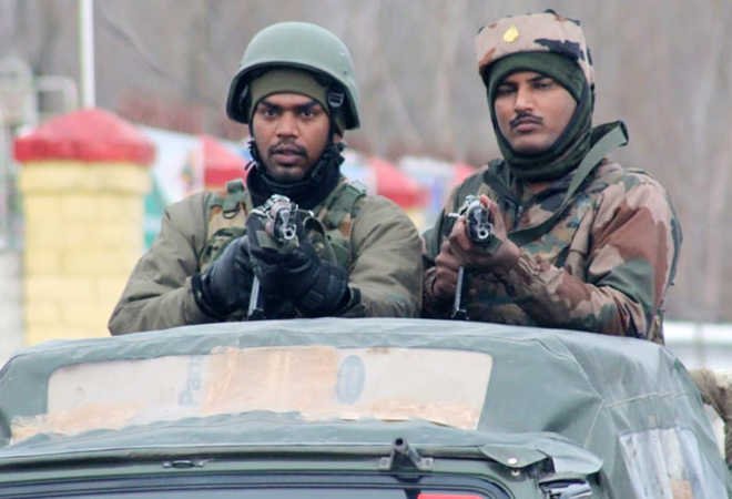 Indian troops harass family, desecrate martyr’s banners