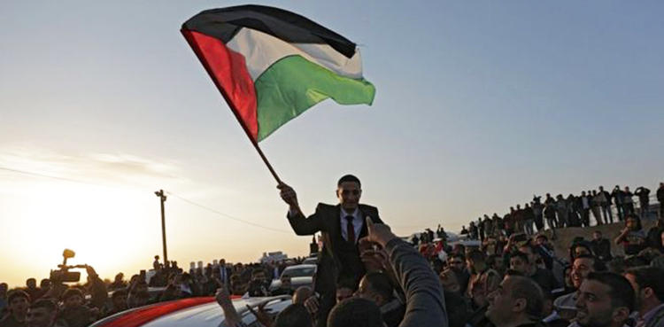 Four killed as thousands protest at border, but Gaza-Israel truce holds