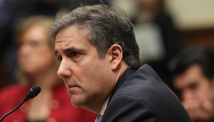 Ex-Trump lawyer brands president 'conman' and 'racist'