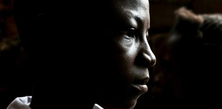 Congo child soldiers surrender arms and amulets