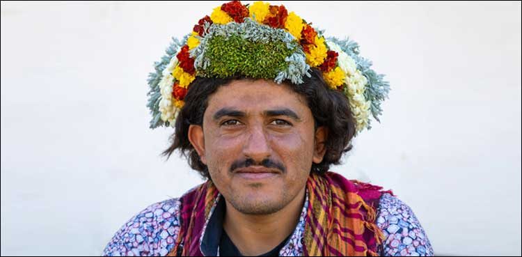 Men wearing floral tiaras? and no its not in a Snapchat filter