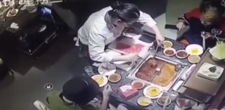 Viral video shows boiling soup exploding on waitress' face
