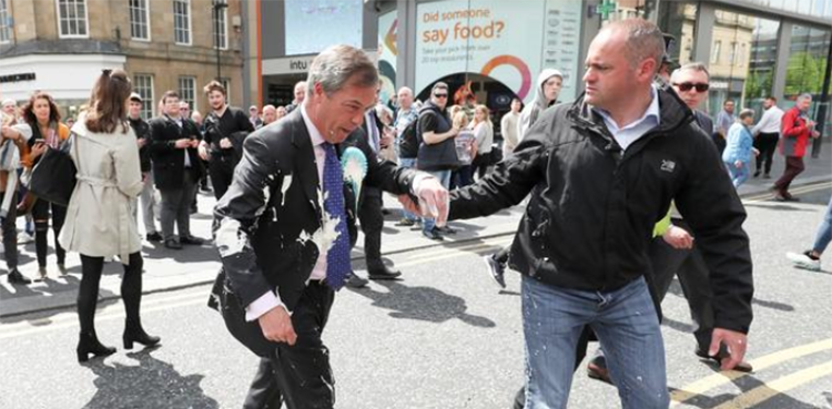 Pro-Brexit politician doused in milkshake by protestor