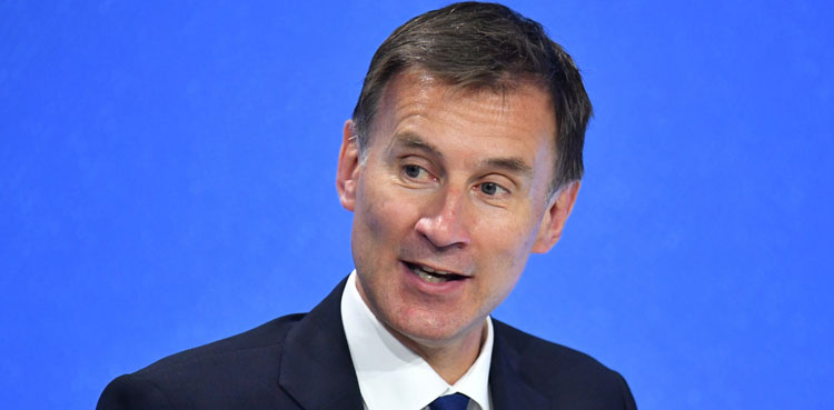 UK finances win boost before key budget