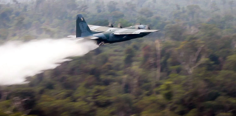 New fires rage in Amazon as Brazil military planes battle flames