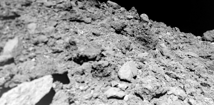 New images from asteroid probe offer clues on planet formation