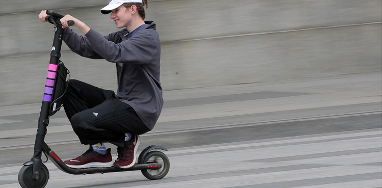Scooters steering new customers to ride-hailing