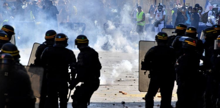 Clashes as 'yellow vest' protesters revive protests across France