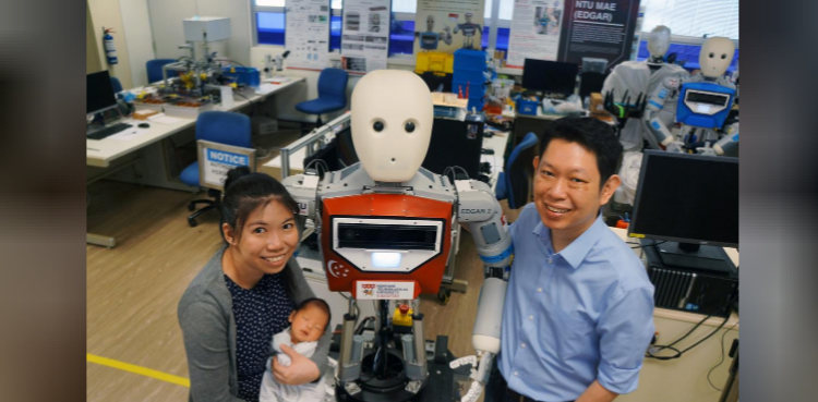 Robot-designing couple welcomes own human creation