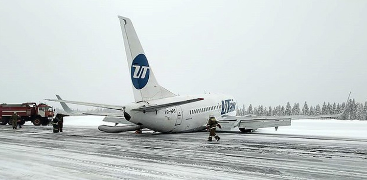 Russian plane crash lands on its belly due to landing gear problem