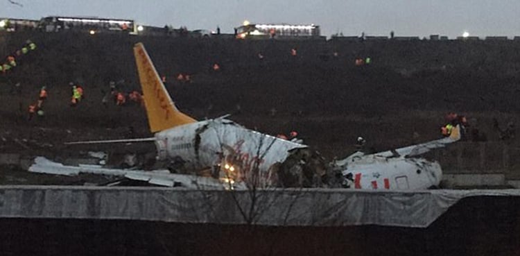 Boeing plane breaks into three pieces after skidding off runway; 52 injured