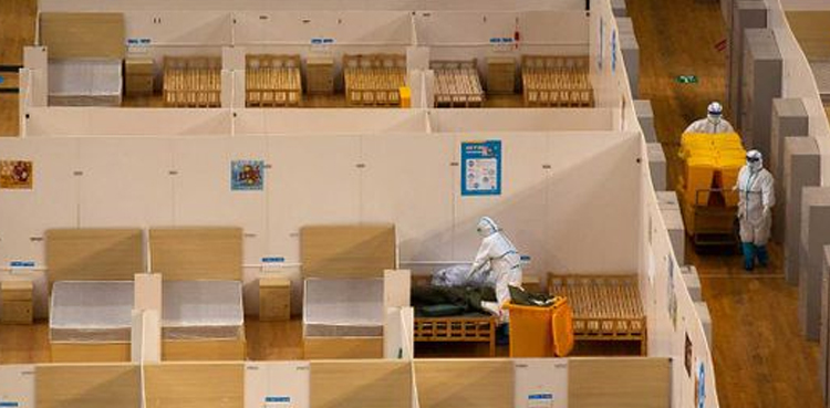 China closes makeshift hospitals as virus cases plunge