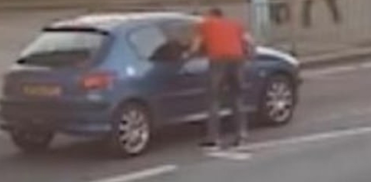 Shocking video shows man being crushed between car and its door